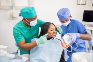 A closeup of a woman during a dental check-up.